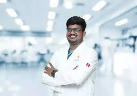 Dr Rakshith B R
